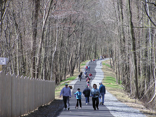 People walking on the Radnor Multipurpose Trail, Radnor Township, PA.