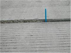 Figure 4.77 shows an example of faulting on a roadway with a jointed plain concrete pavement (JPCP) surface.