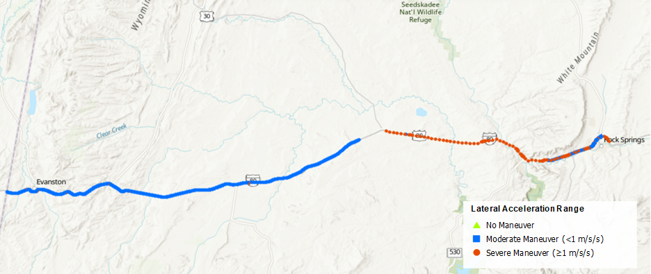 This map shows lateral acceleration points with different maneuver categories on Interstate 80 between Evanston and Rock Springs, Wyoming. Most of the road shows moderate maneuvers (less than 1 meter per second square), but there are also several instances of severe maneuvers (greater than or equal to 1 meter per second square) as the road gets closer to Rock Springs.