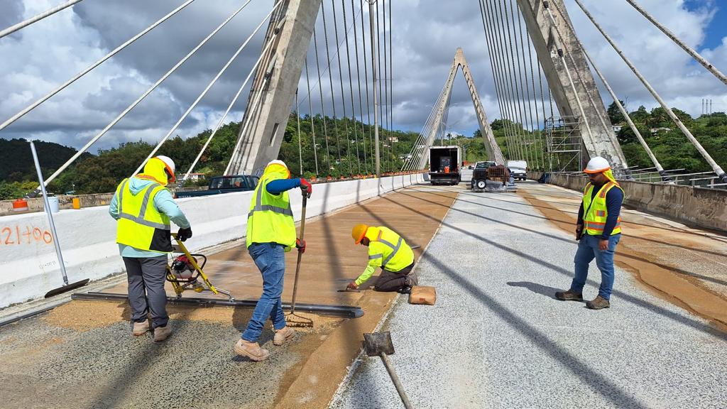 Men working on Naranjito Cable-Stayed Bridge Deck.