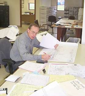 Photo: Man working at desk