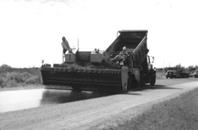 Dump truck and heavy equipment speading sealer.