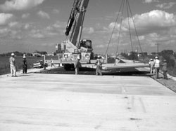 A full-width base panel being put into place