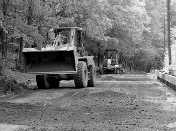 Roadway being graded after pulverization