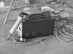 Hand tool attached to an electronic control box and water cooling system
