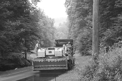 A chip seal being placed on road in North Carolina