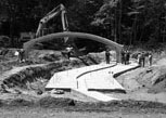 Precast concrete arch bridge under construction