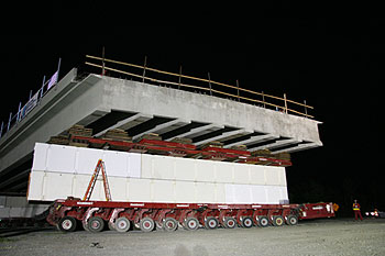 SPMTs are multi-axle computer controlled vehicles that can move in any horizontal direction and also have vertical lift.