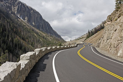 Figure 3. Photo. A view of the East Entrance Road to Yellowstone National Park in Wyoming.