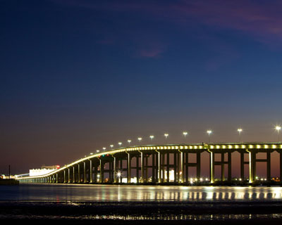 Figure 5. Photo. A nighttime view of the Biloxi Bay Bridge in Biloxi, Mississippi.