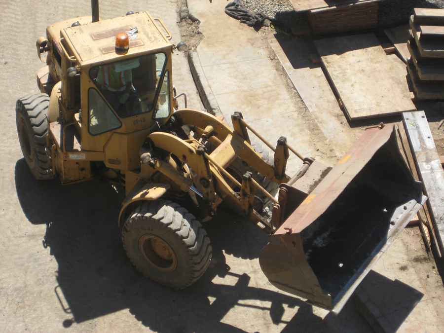 : A rubber tire loader on the construction site of the San Francisco-Oakland East Bay Bridge.
