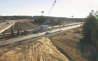 Figure 1. Photo. An aerial view of a highway construction site.