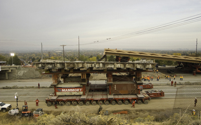 Figure 7. Photo. An aerial view of a self-propelled modular transporter (SPMT) used to move and replace the 4500 South bridge in Salt Lake City, Utah.