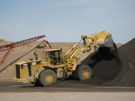 A front loader moves RAP from a stockpile at an asphalt plant in Minnesota.