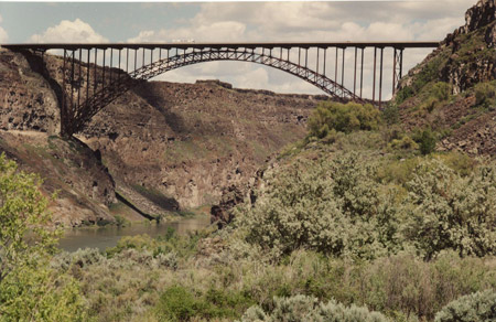 A side view of the Perrine Bridge in Twin Falls, Idaho. The truss arch bridge spans the Snake River Canyon on the northern edge of Twin Falls.