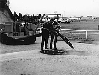 Field demonstration highlighting use of the velocity-fill pothole patcher.