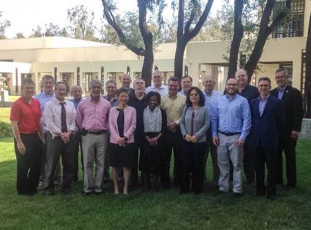 The photograph shows the Transportation Research Board and LTPP Committee Meeting members meeting at the National Academy of Sciences Beckman Center, Irvine, CA.