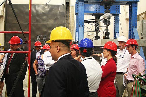 The Congressional staff members get an up-close look at research being done in the Structures Laboratory to help upgrade national bridge design specifications and improve the safety, reliability, and cost effectiveness of bridge construction in the United States.