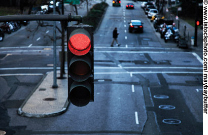 Photo. A red traffic signal.