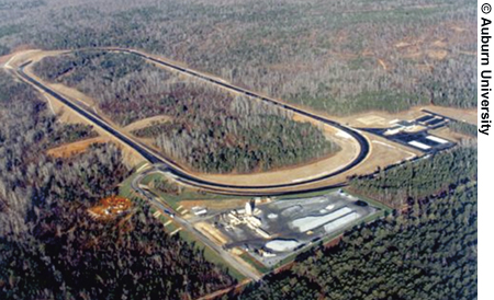 An aerial view of an oval test track.