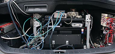 Computing and navigating instruments in the trunk of a project test vehicle, demonstrated at FHWA’s Turner-Fairbank Highway Research Center