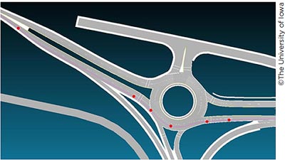 An illustration shows a bird’s eye view of a roundabout layout with red dots marking a vehicle’s path through the roundabout.