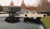 Photograph of a camera and LIDAR equipment mounted on the roof of the test vehicle.