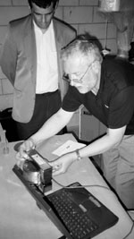 TFHRC researcher using laboratory equipment.