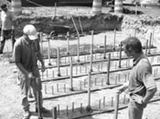 TFHRC geotechnical researchers conducting experiment. 