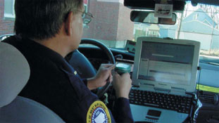 Police officer in vehicle