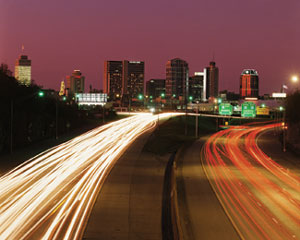 Metropolitan skyline and traffic. 