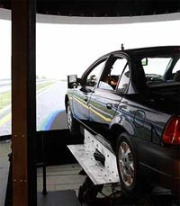 This figure illustrates the full-scale driving simulator that enables FHWA to study drivers in real-world conditions. (Image: FHWA)