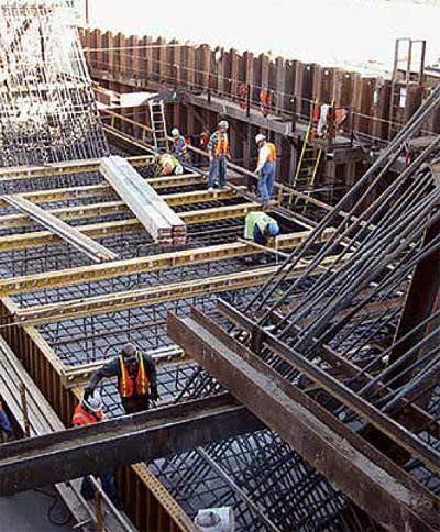 This figure shows how Placing of rebar prior to concrete pour during construction of a pylon on Christopher Bond Bridge construction project was one of many cost-effective, technical engineering solutions that saved time and provided flexibility in the bridge construction schedule. (Image source: FHWA)