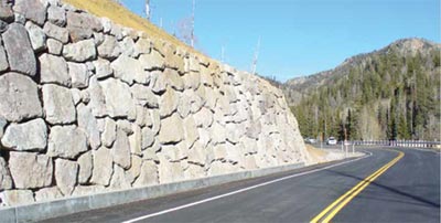 This figure shows how the FHWA guidelines on building rockeries, like this one on State Route 153 in Utah’s Fishlake National Forest, have reduced the cost of building walls by as much as 50 percent. (Image source: FHWA)