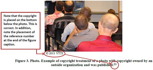 The photo is of an audience watching a presentation and is an example of copyright treatment of a photo with copyright owned by an outside organization and the photo was previous published. The significance of the photo is that directly below the photo, it shows the copyright symbol immediately followed by the year and the name of the company. In addition, because the photo was previously published by the organization, a non-Federal Government agency, the photo caption shows a reference number that corresponds to a reference citation on the reference list. 