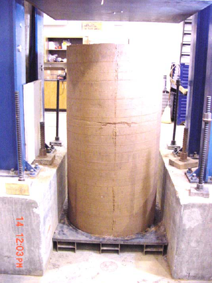 This photo shows a cylindrical test specimen for one of seven unconfined compression tests conducted by Elton and Patawaran. The cylinder appears solid and smooth around the outside.