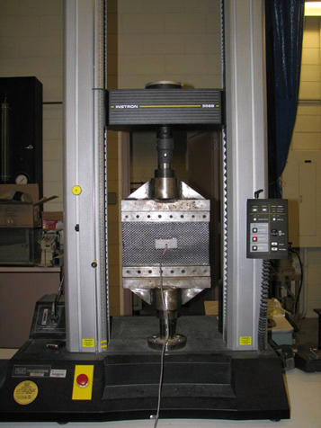 This photo shows the apparatus used to perform uniaxial tests on samples of geosynthetics.