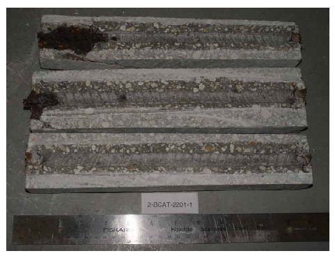 Extensive corrosion products are apparent at two of the trace ends.