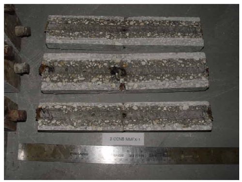 Corrosion products are apparent on all three traces near the location of the simulated crack and at several of the trace ends.