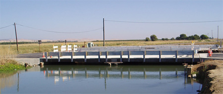 The photo shows a multicell box girder bridge over the Glen-Colusa Canal outside Colusa, CA.