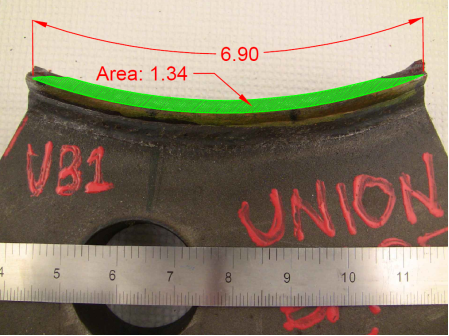 This photo shows the fracture surface. The crack has a total length of 6.90 inches along the outside diameter of the tube and a total area of 1.34 square inches.