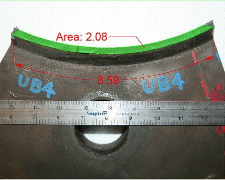 This photo shows the fracture surface. The crack has a total length of 8.59 inches along the outside diameter of the tube and a total area of 2.08 square inches.