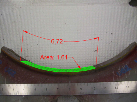 This photo shows the fracture surface. The crack has a total length of 6.72 inches along the outside diameter of the tube and a total area of 1.61 square inches.