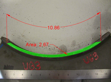 This photo shows the fracture surface. The crack has a total length of 10.86 inches along the outside diameter of the tube and a total area of 2.67 square inches.