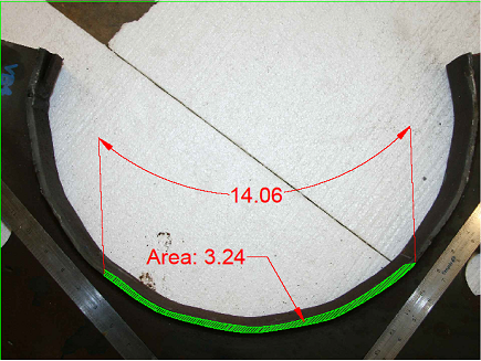 This photo shows the fracture surface. The crack has a total length of 14.06 inches along the outside diameter of the tube and a total area of 3.24 square inches.