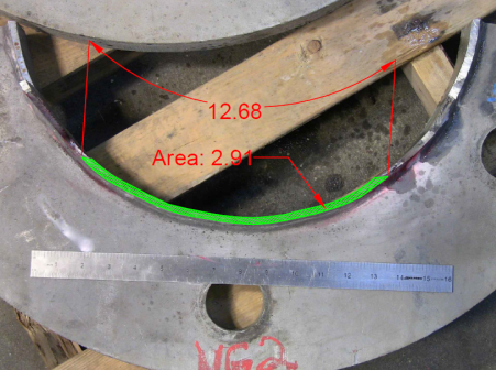 This photo shows the fracture surface. The crack has a total length of 12.68 inches along the outside diameter of the tube and a total area of 2.91 square inches.