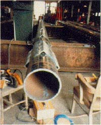 Field instrumentation of a pipe pile for field load test in sand.