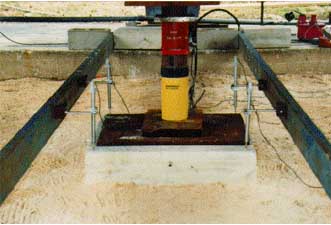 Spread footing load test on reinforced soil foundation