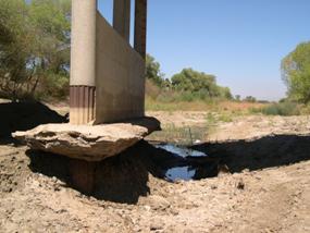 Figure 39. Murietta Creek, Pacific Coastal-upstream toward bridge. Photo. This is looking upstream toward the bridge and underneath it. There is a large scour hole around the pier.