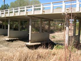 Figure 40. Murietta Creek, Pacific Coastal-looking upstream at bridge. Photo. This is looking upstream at the bridge. The photo shows scour around two piers.